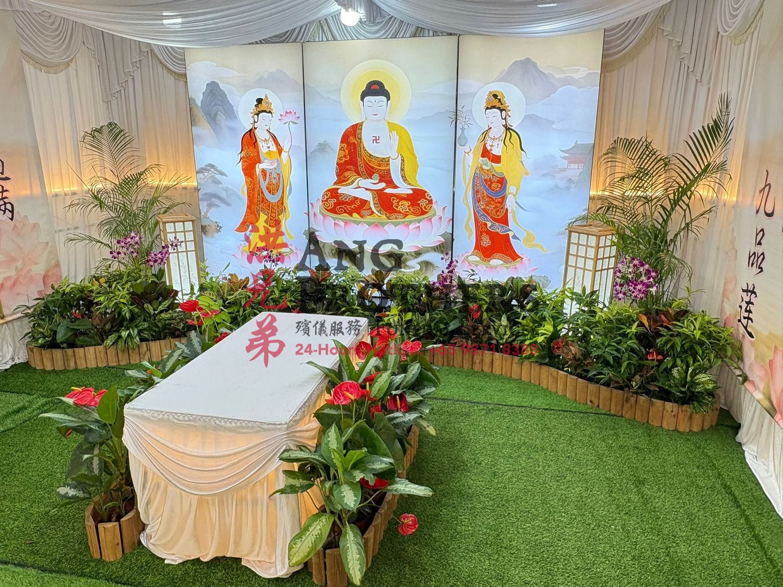 A painted Amitabha triptych with two Bodhisattvas on lotus thrones