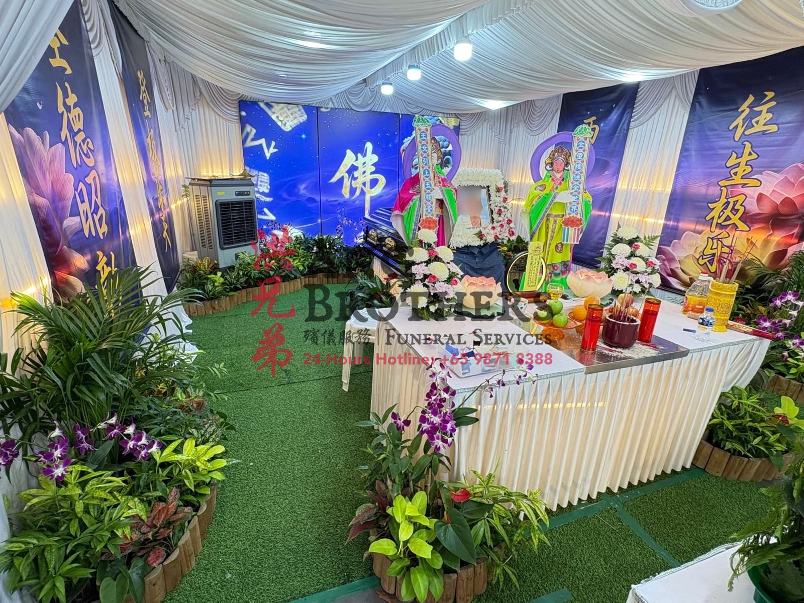 Buddhist funeral setup by Ang Brothers
