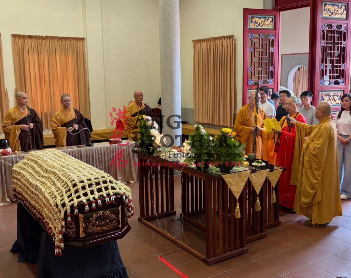 Monks conducting the rites at a Buddhist wake