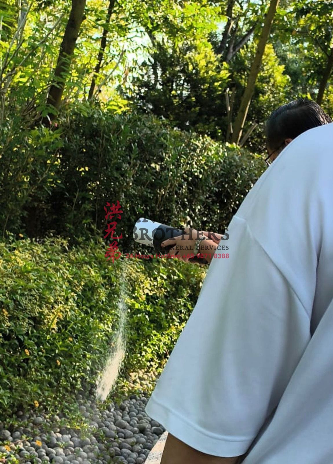 Pouring ashes into the landscaped garden at the Garden of Peace
