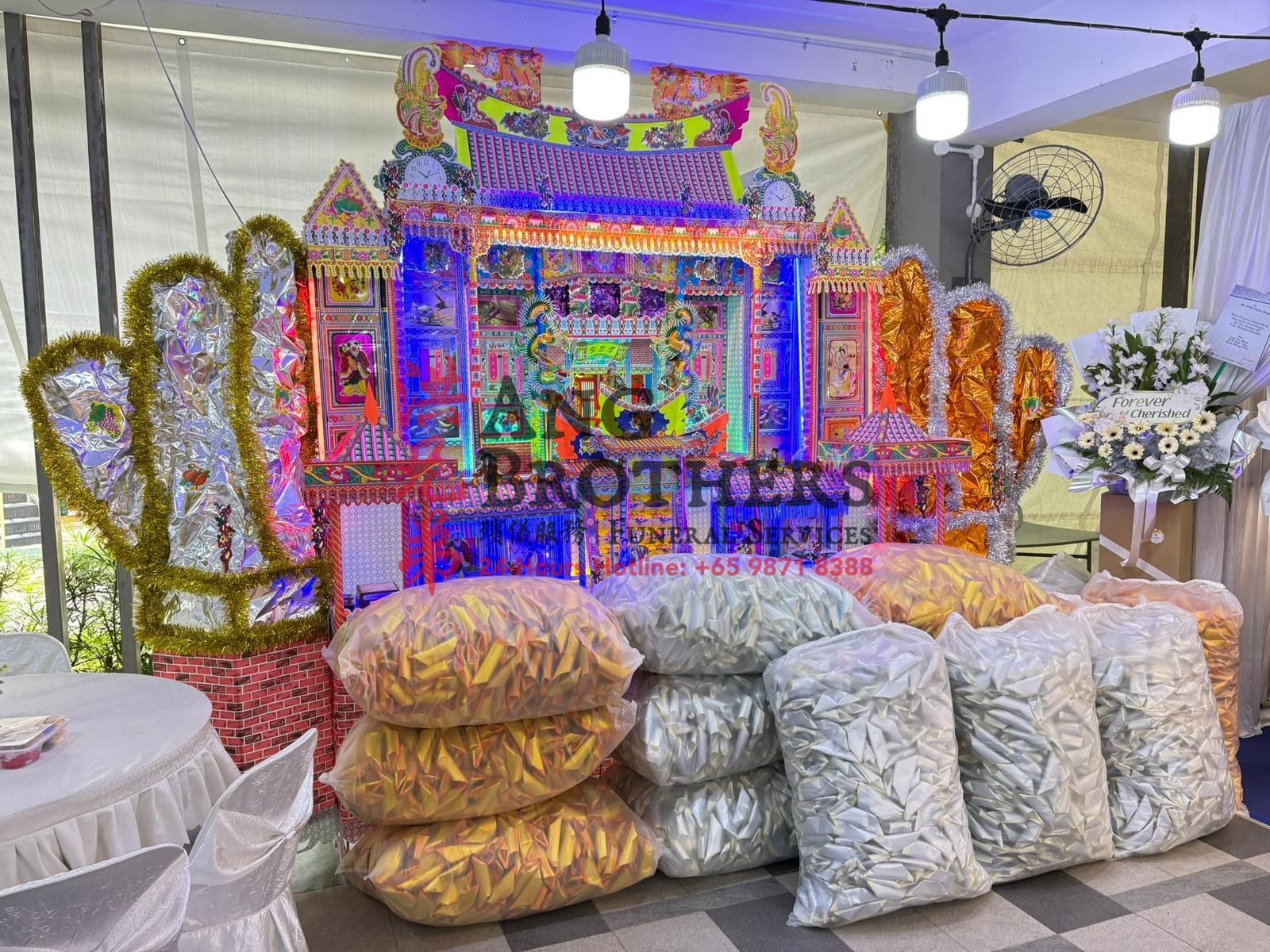 Paper mansion and gold offerings made by Ang Brothers
