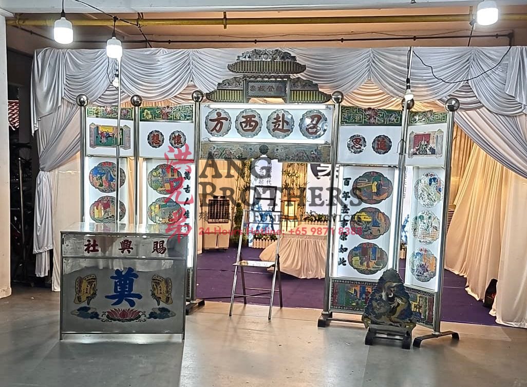 A hand painted Taoist memorial gateway for the send off by Ang Brothers